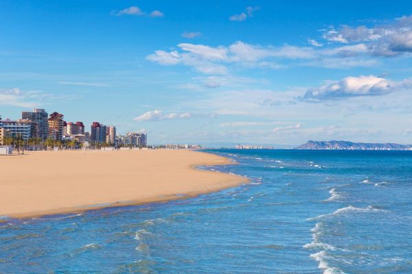 Gandía beach with parasols and fine sand